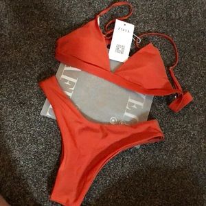 Brand new orange bathing suit